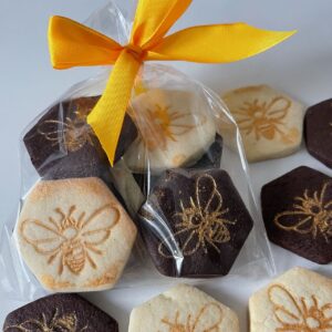 Shimmery bee biscuits in a gift bag to share